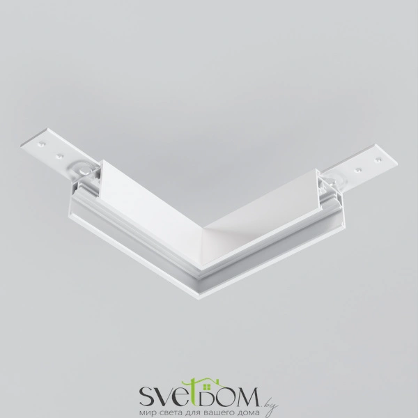 Коннектор угловой Exility накладной низкопрофильный TRAM034CL-41W